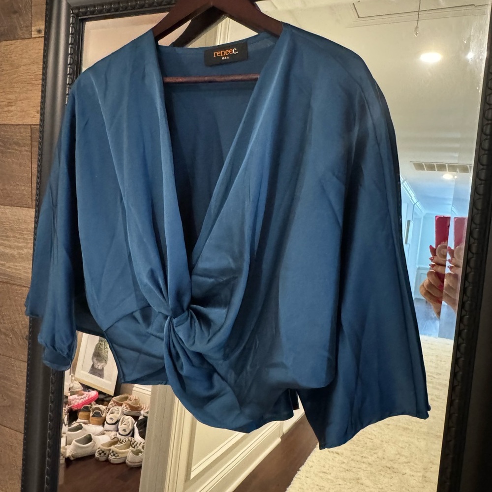 Blue satin crop top with bell sleeves